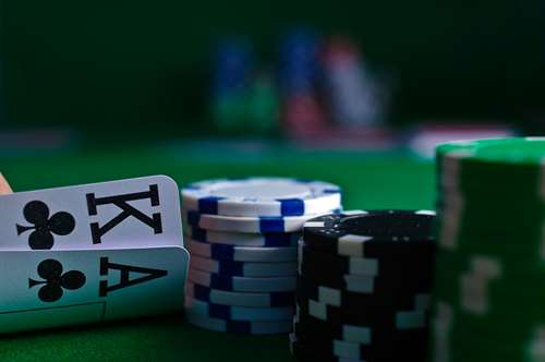 Poker chips and playing cards.